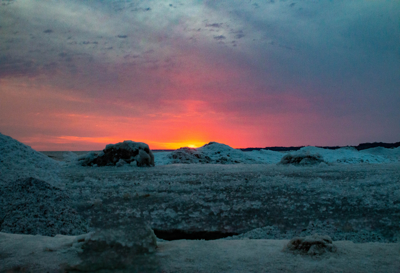 Port Stanley Ontario winter beach at sunset — navigating economic uncertainty