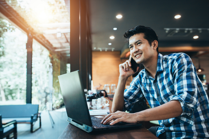 Self-employed man talking on his cell phone