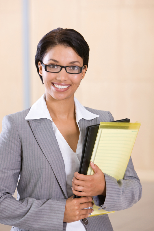 Professional bookkeeper holding a folder Professional bookkeeper holding a folder